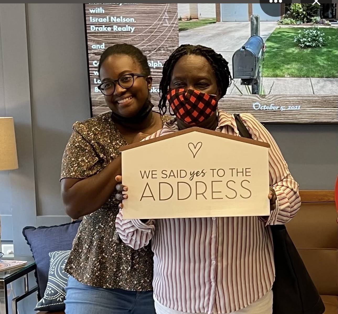 Patricia Nyathi - Patricia Nyathi celebrating Peachtree City home purchase with Israel Nelson realtor